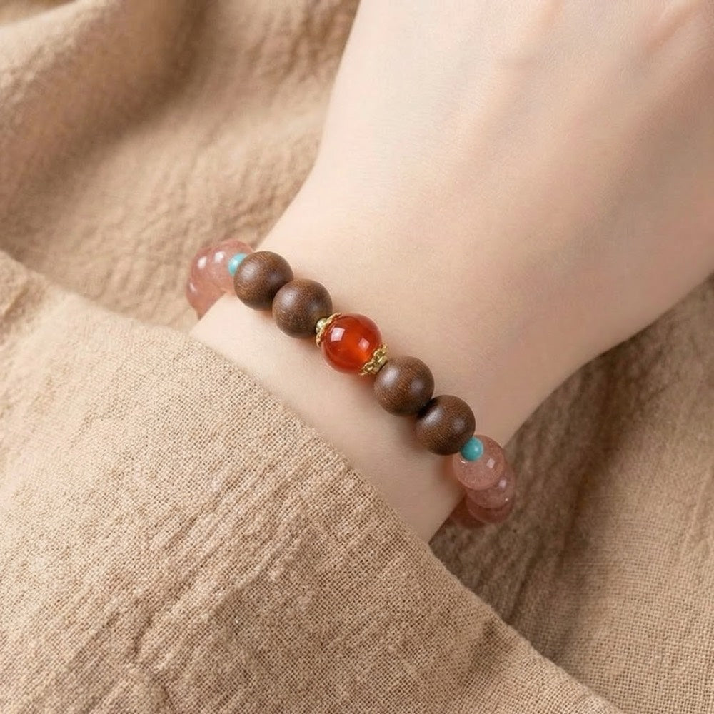 Close-up of Strawberry Quartz and Red Agate beads for love and attraction - Arcane Bloom
